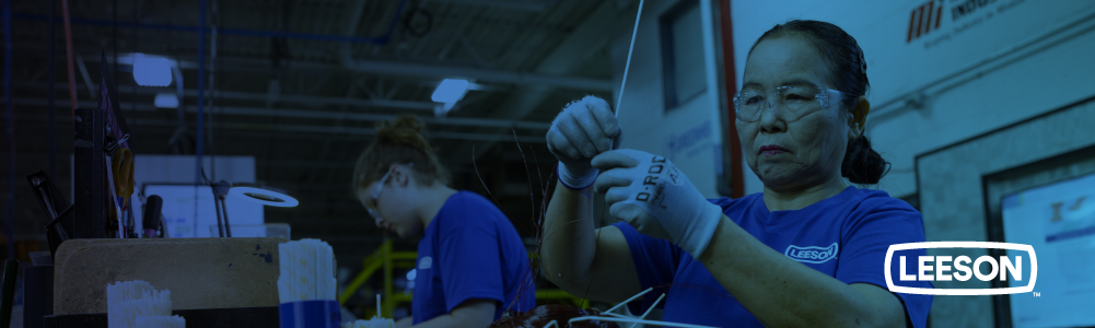 factory workers with white gloves