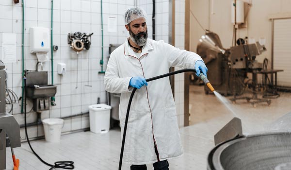 Photo of washdown procedure in food processing facility