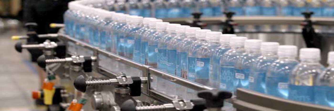 System Plast SpeedSet system on a bottling line