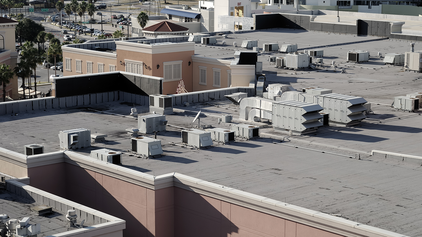 rooftop of a hospital with the chiller and condenser parts