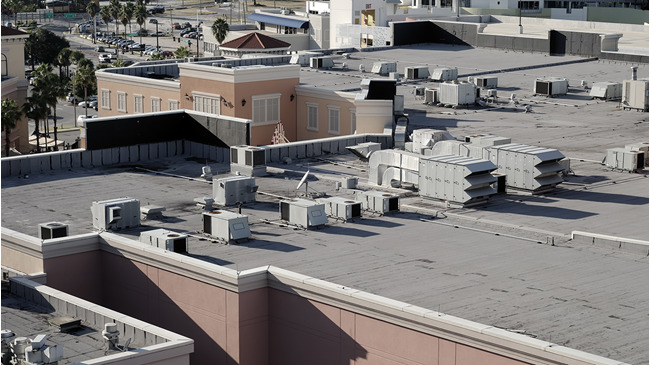 rooftop of a hospital with the chiller and condenser parts