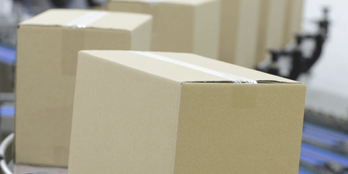 Material Handling Brown Boxes on Conveyor