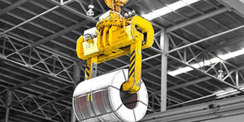 Interior crane with a slip ring motor lifting a rolled item