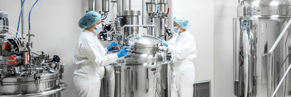 Workers and equipment in a washdown environment.