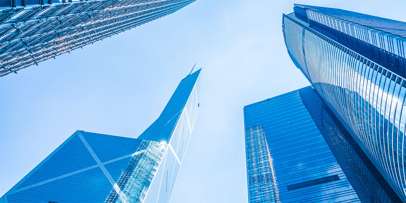 Four buildings in blue accent