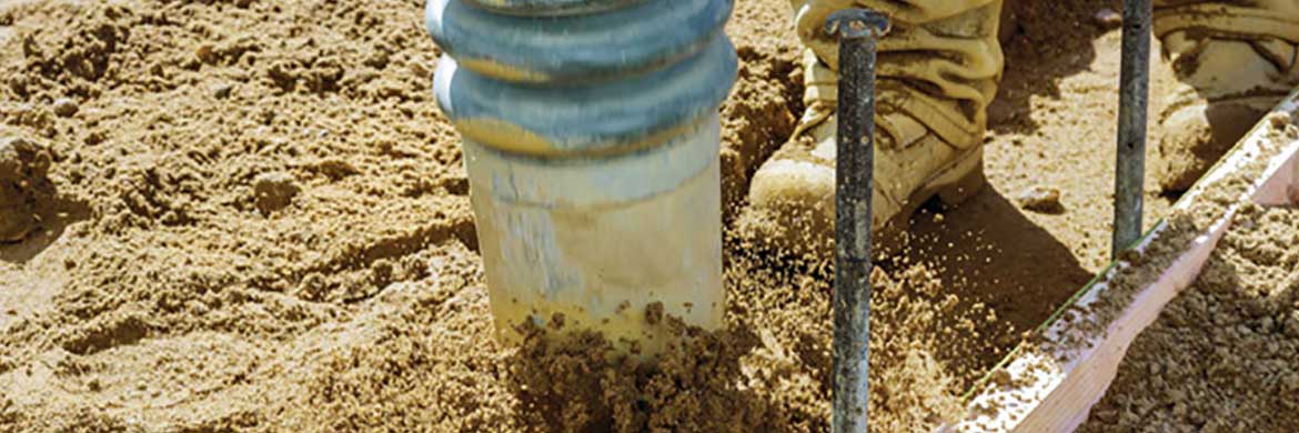 Drill digging into the ground.